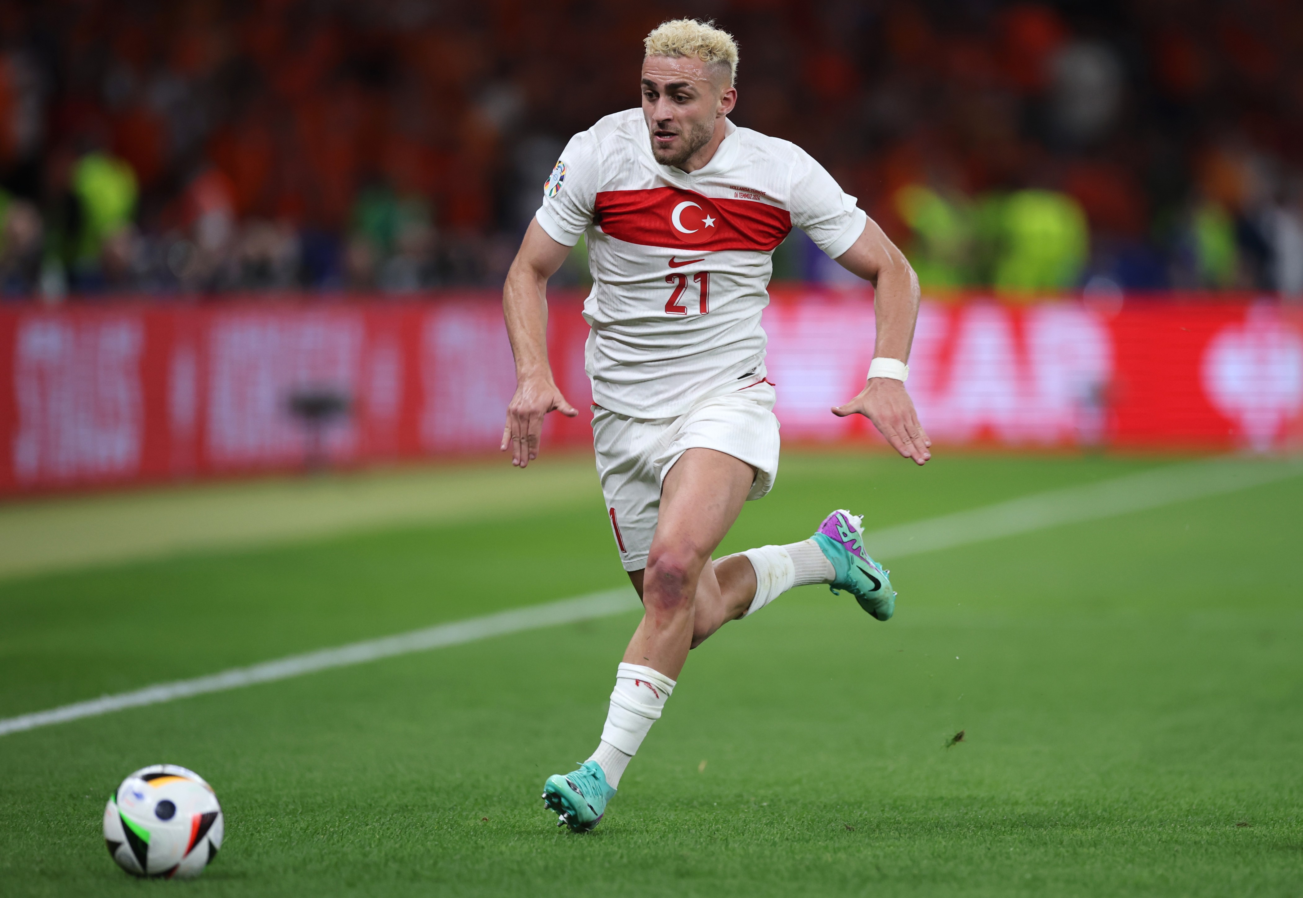 Baris Alper Yilmaz of Turkiye controls the ball