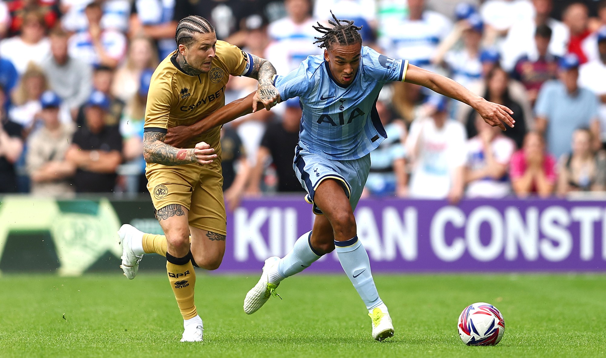 Tottenham Hotspur player Ashley Phillips in action