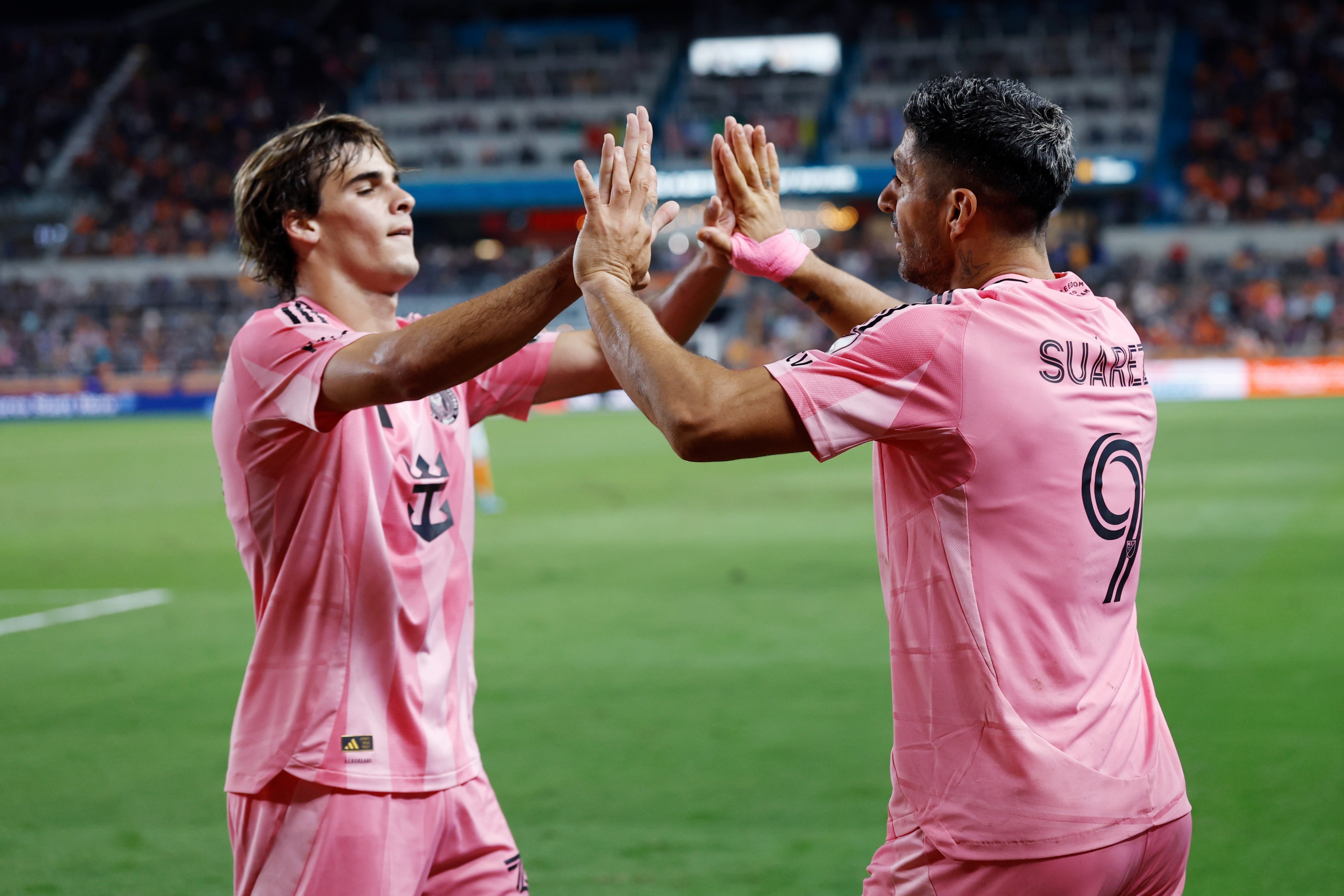 Luis Suárez of Inter Miami CF celebrates with teammate Benjamin Cremaschi after scoring
