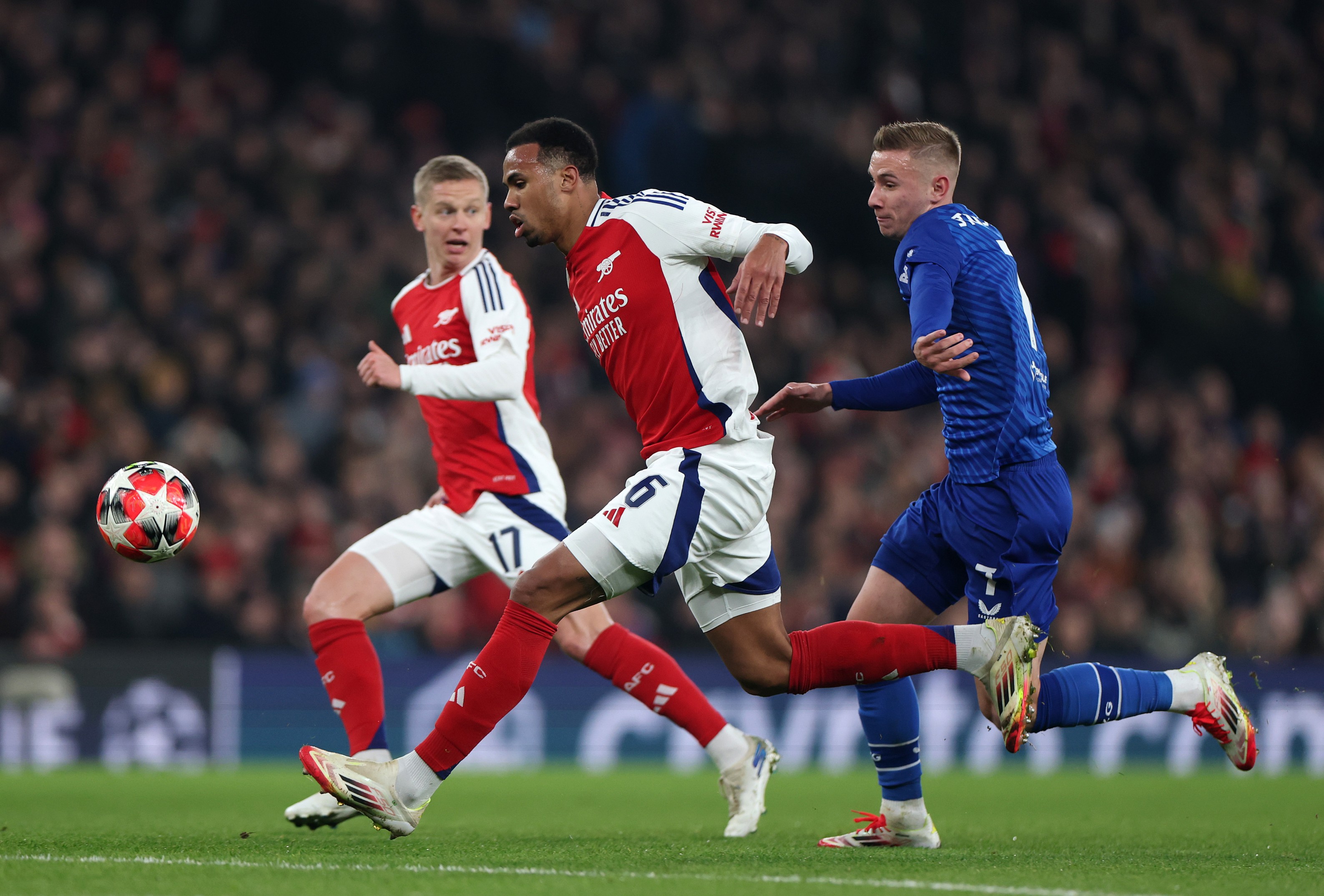 Gabriel of Arsenal runs with the ball whilst under pressure from Luka Stojkovic of GNK Dinamo