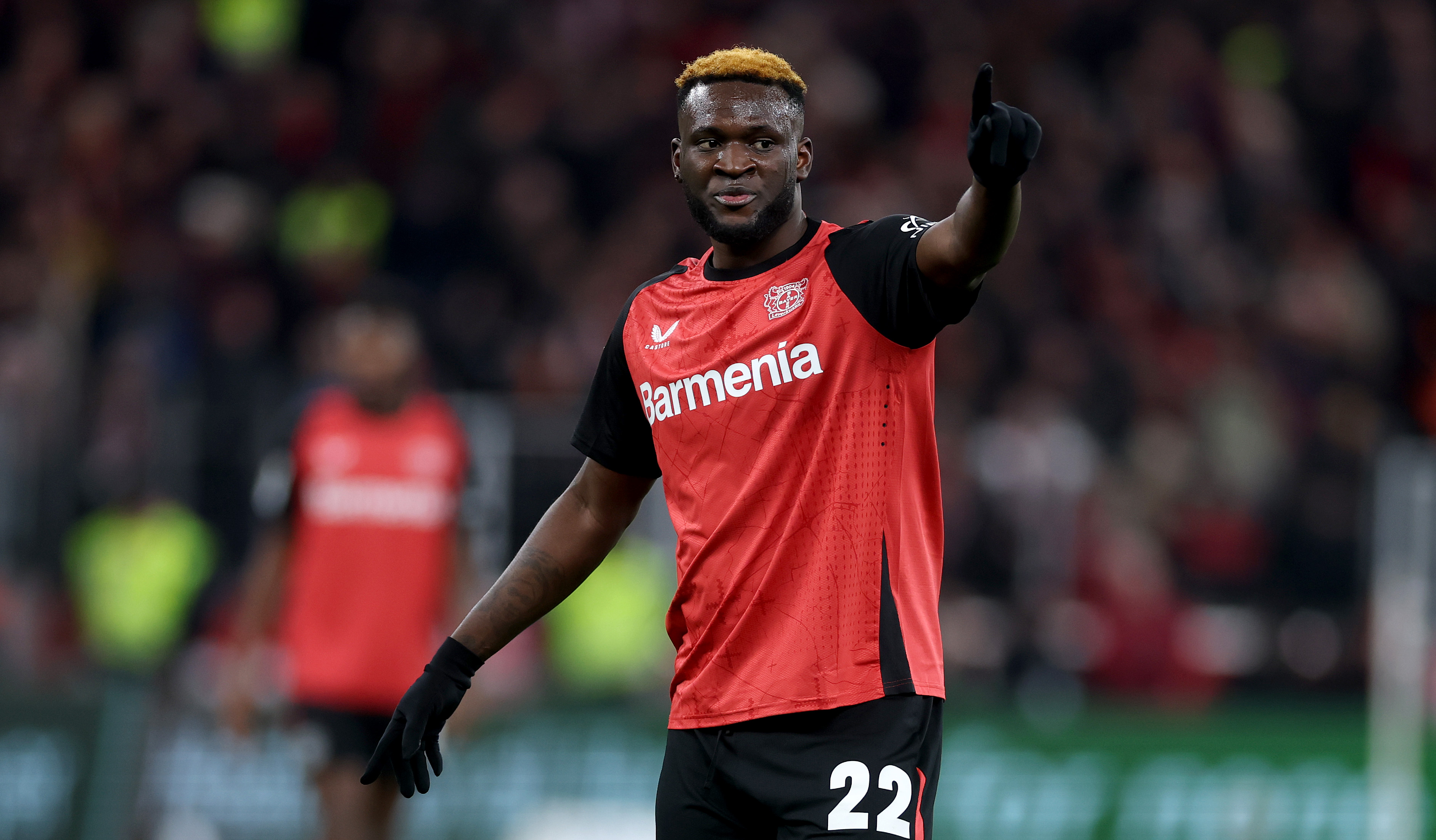 Victor Boniface of Bayer 04 Leverkusen gestures during a Bundesliga match