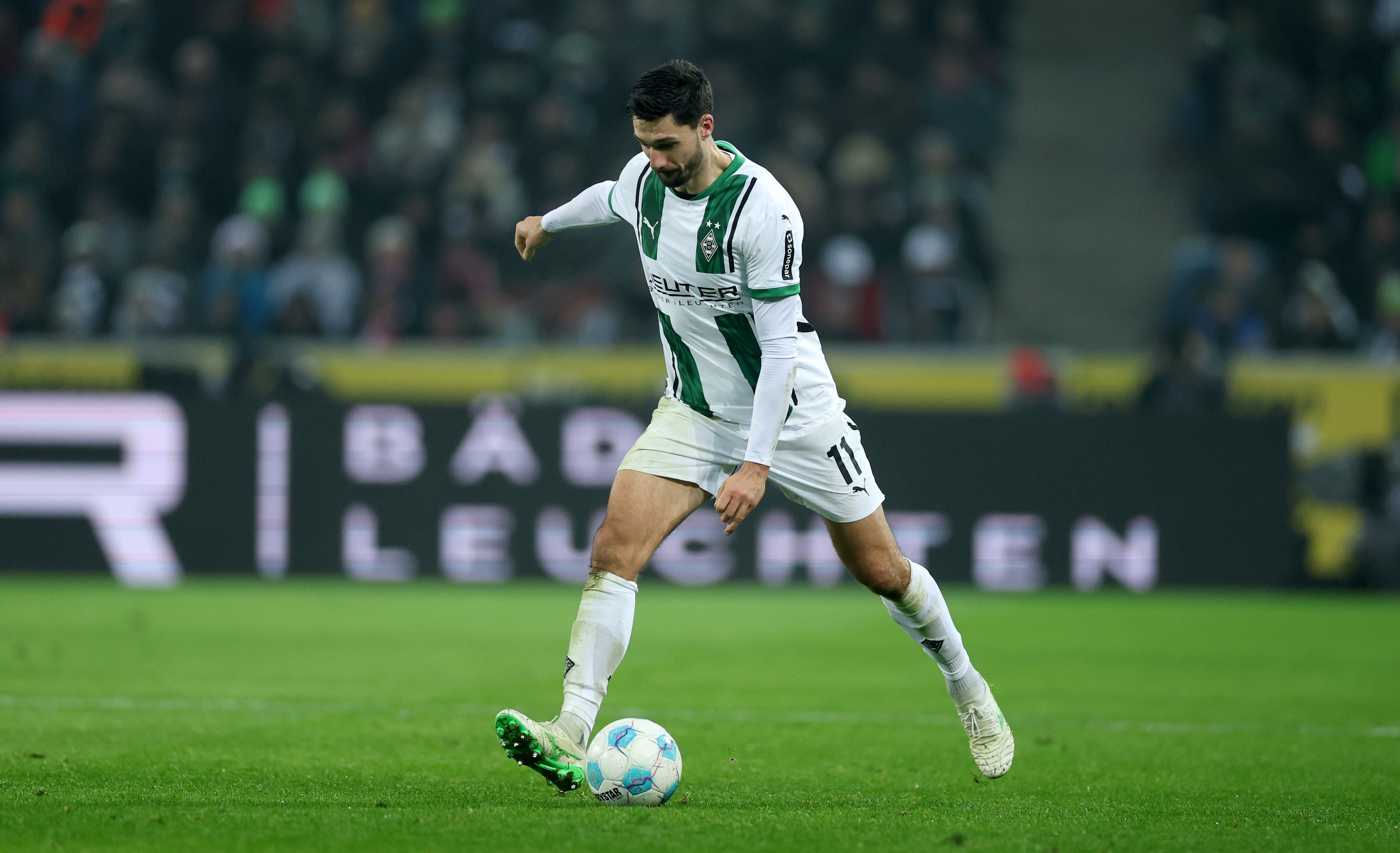 Tim Kleindienst of Borussia Moenchengladbach runs with the ball