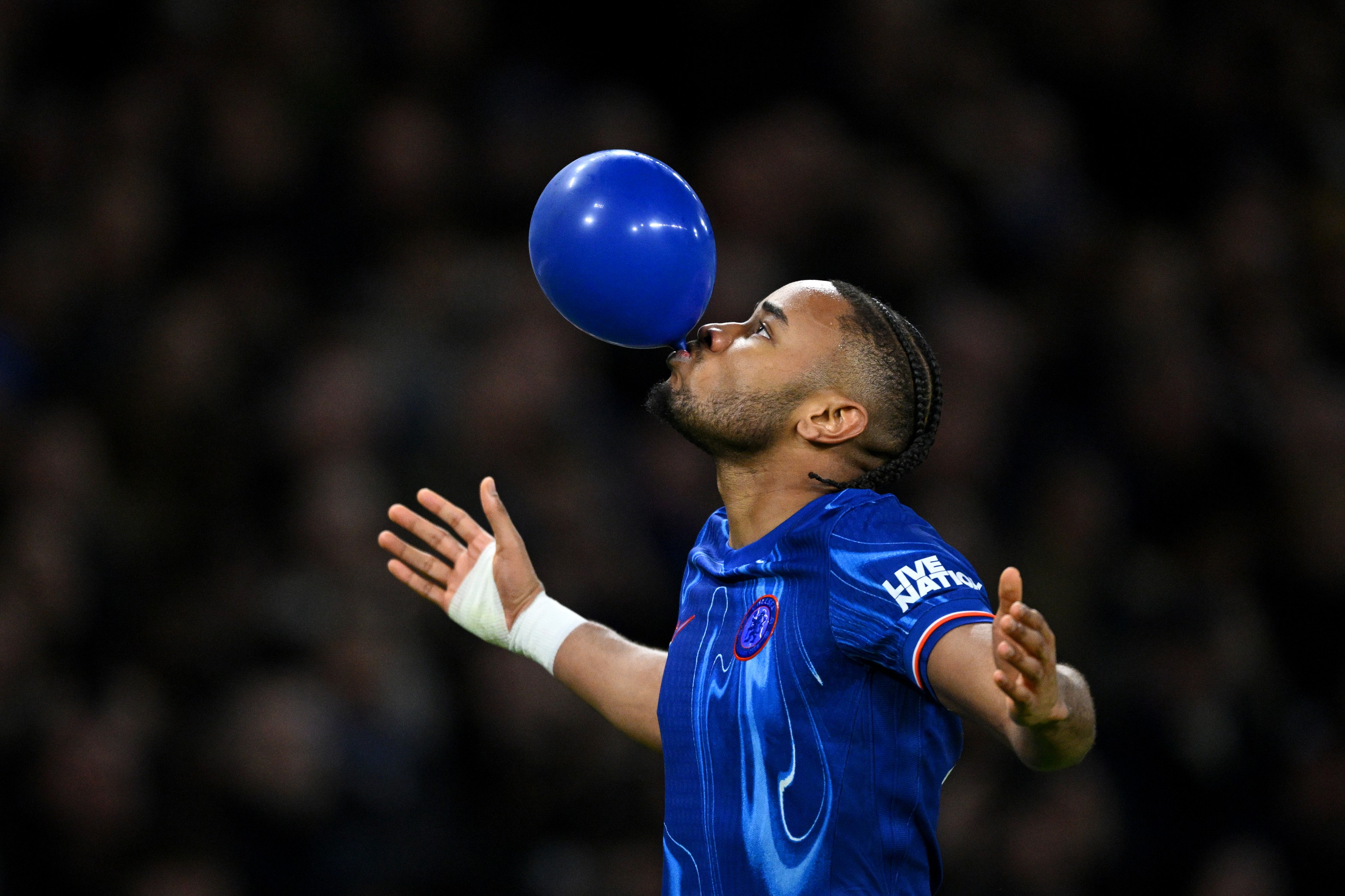 Christopher Nkunku celebrates a goal for Chelsea