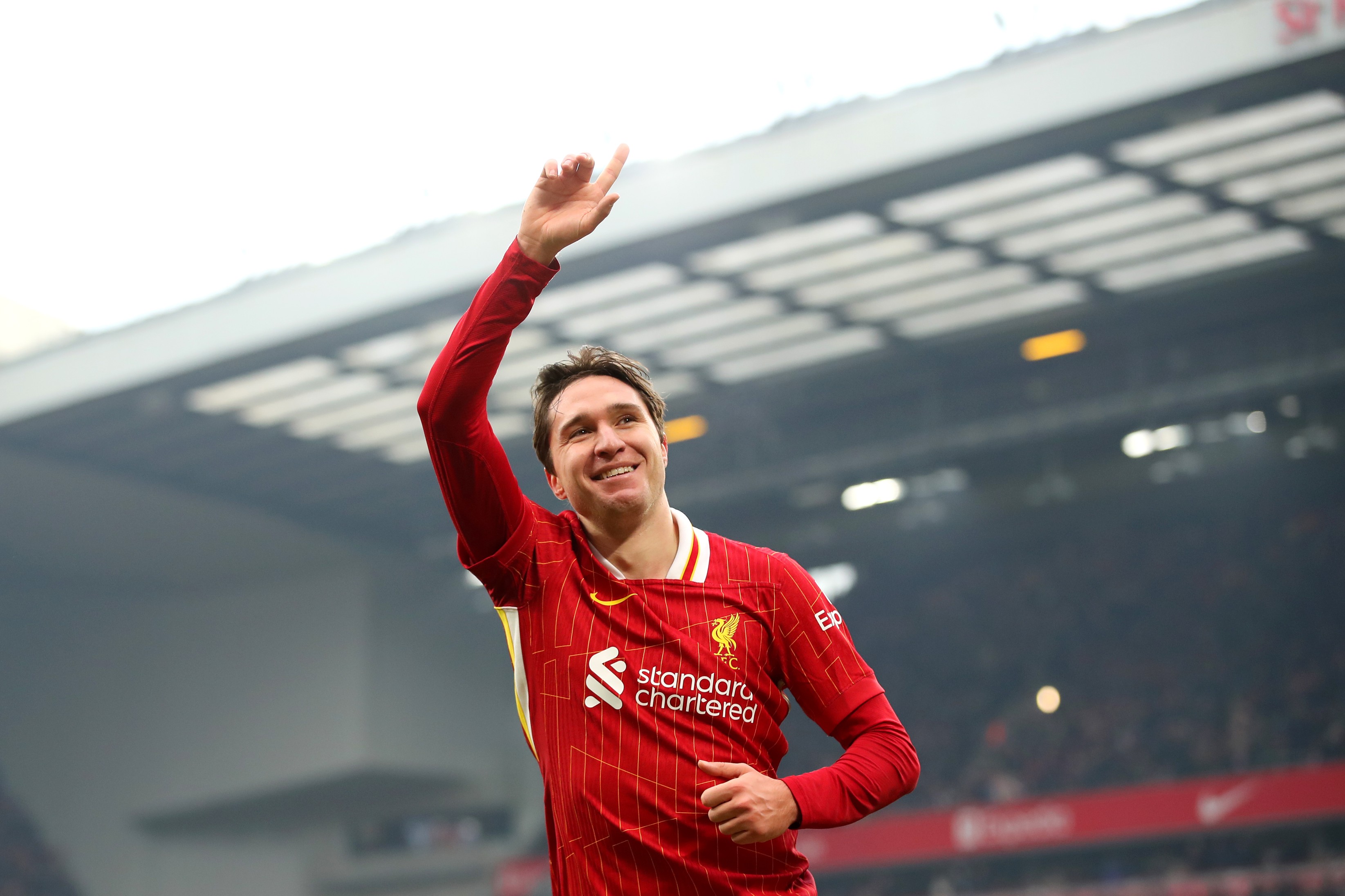Federico Chiesa of Liverpool celebrates scoring his team's fourth goal