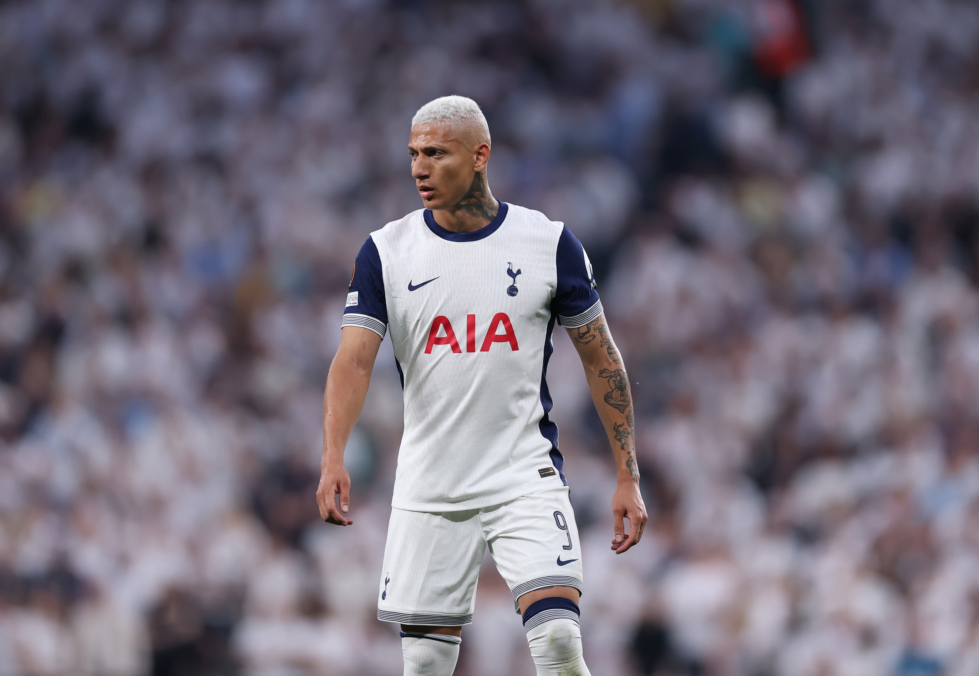 Richarlison of Tottenham Hotspur looks on