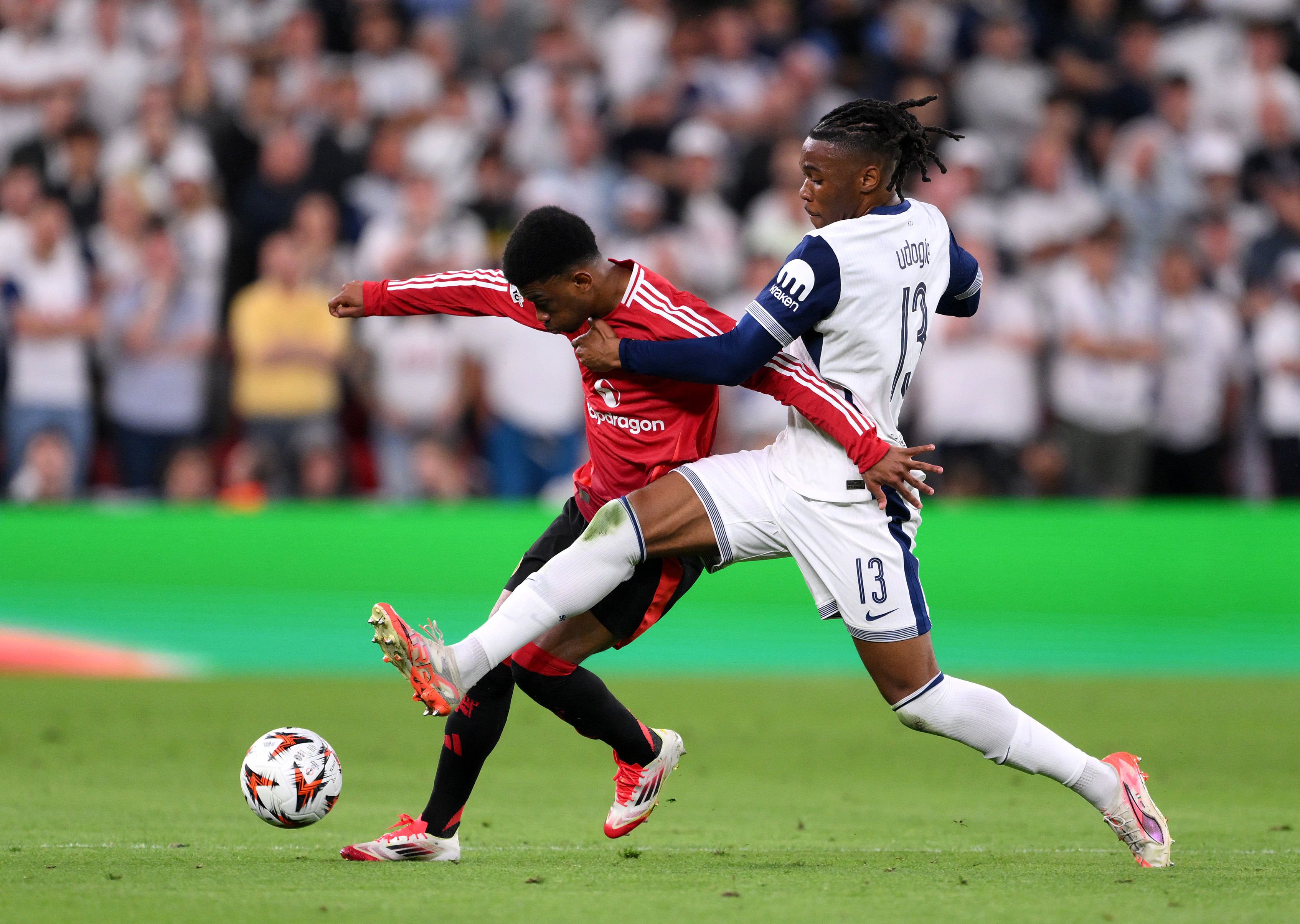 Destiny Udogie in action for Tottenham