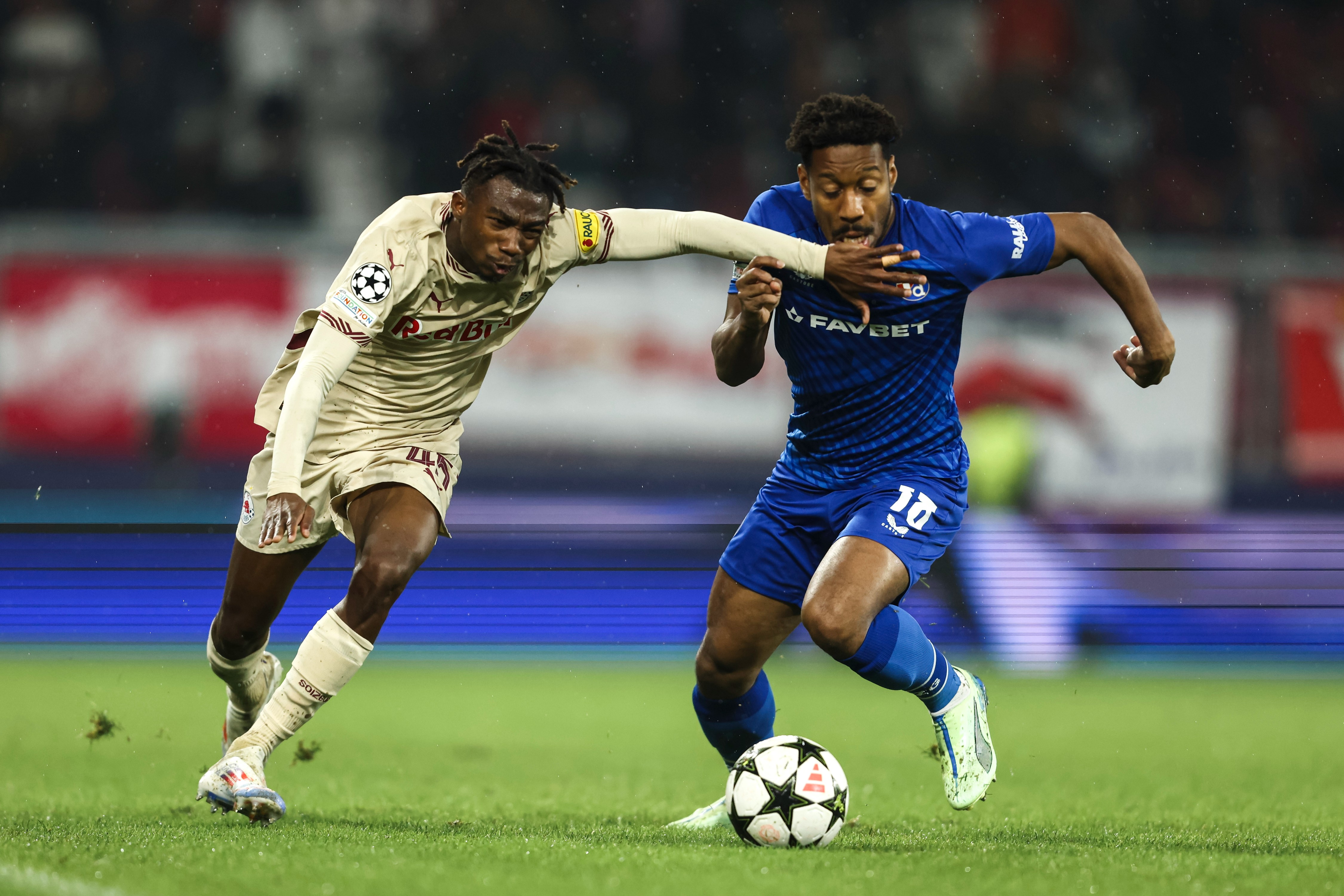 Dorgeles Nene of FC Salzburg in action with Ronael Pierre-Gabriel of GNK DInamo
