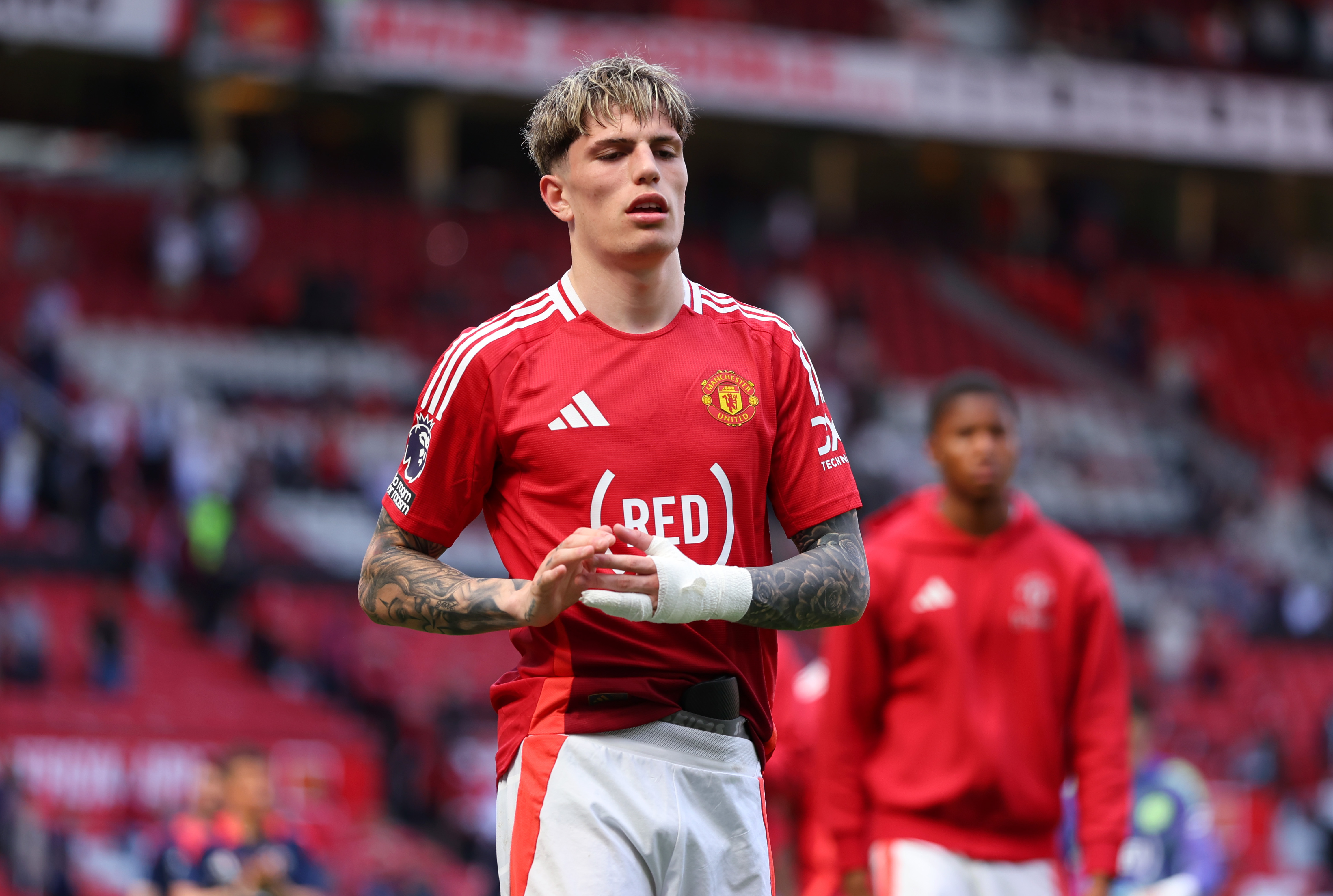 Alejandro Garnacho of Manchester United looks dejected following the team's defeat