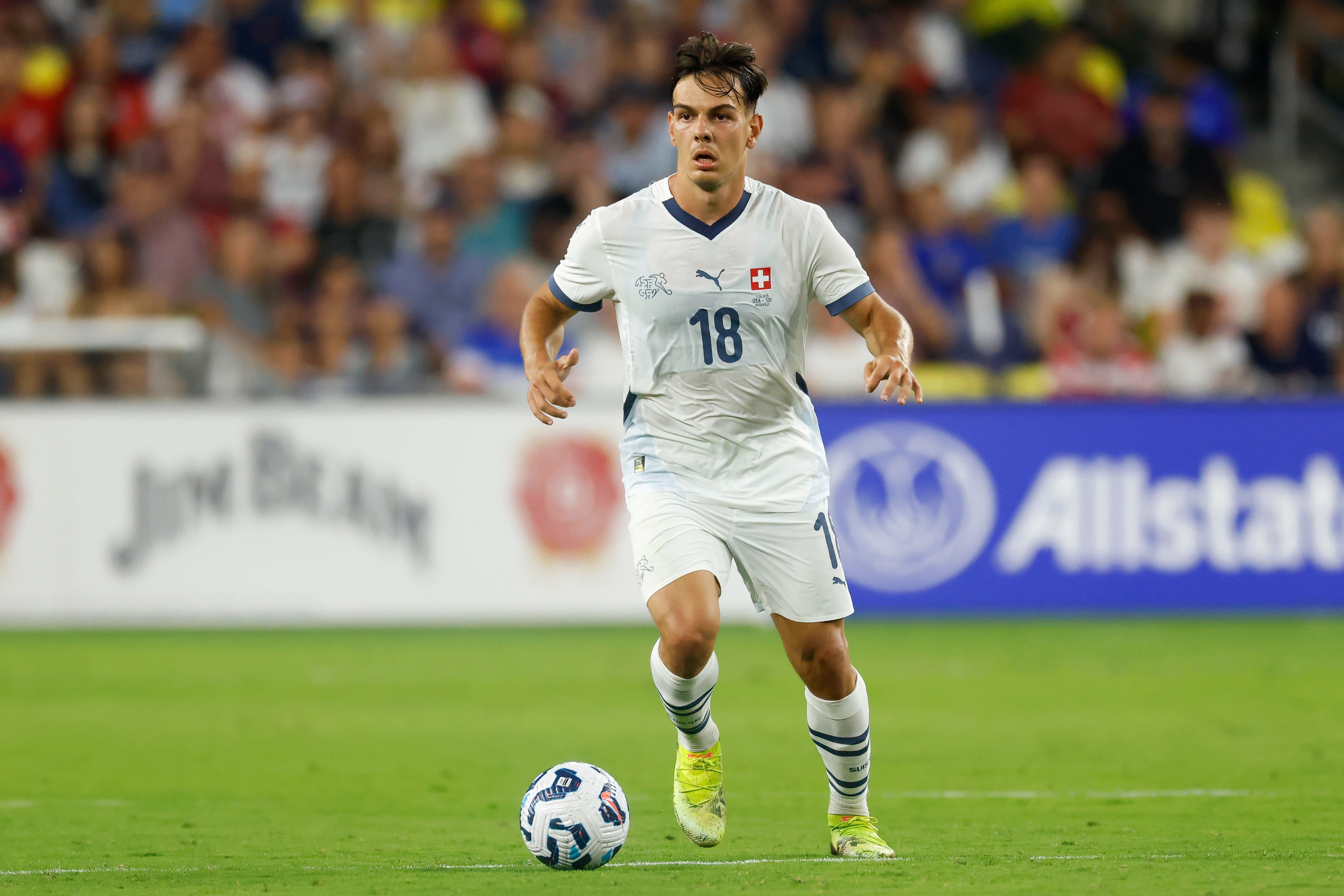 Ardon Jashari #18 of Switzerland dribbles with the ball