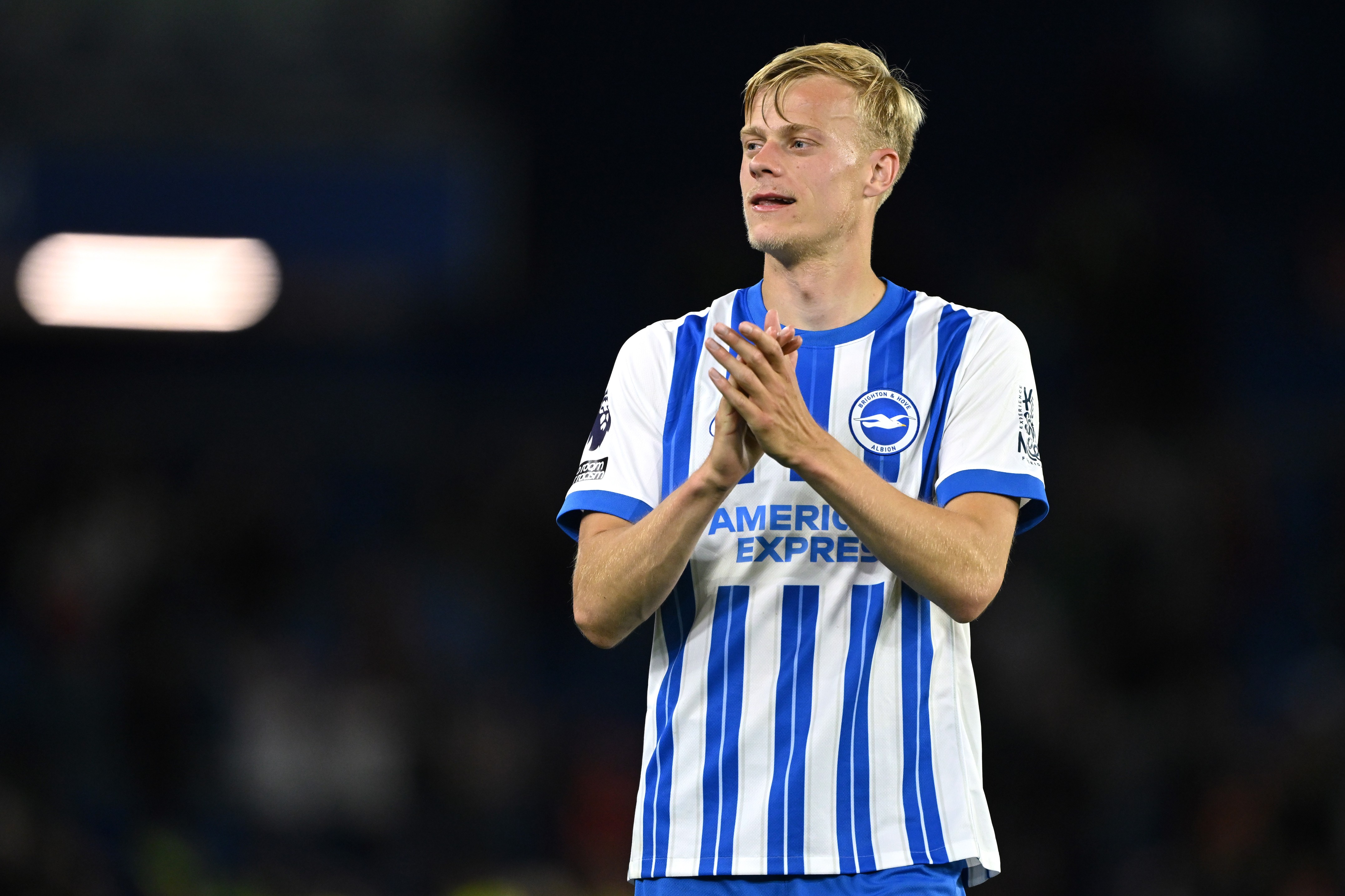 Jan Paul van Hecke of Brighton & Hove Albion acknowledges the fans