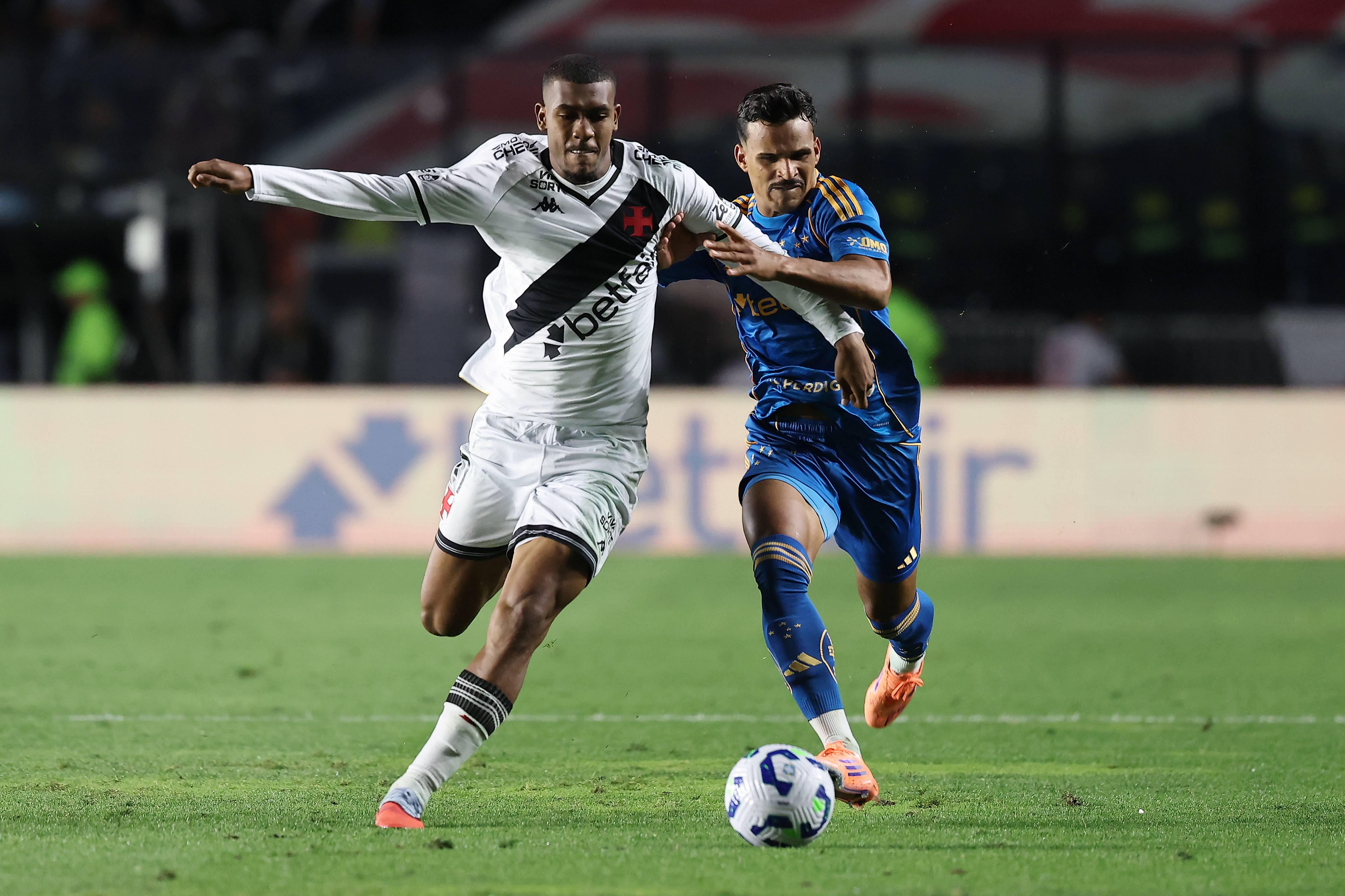 Rayan vies for the ball