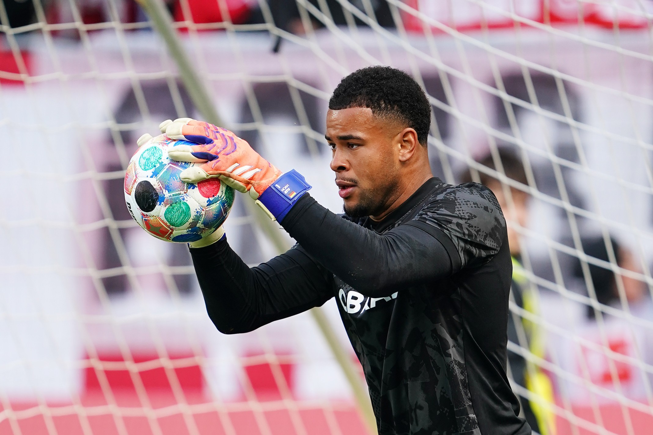 Noah Atubolu of SC Freiburg warms up prior to the Bundesliga match